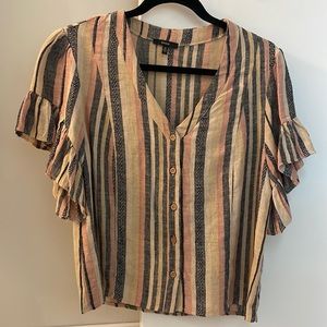 Striped shirt with ruffle details